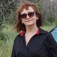 Мила