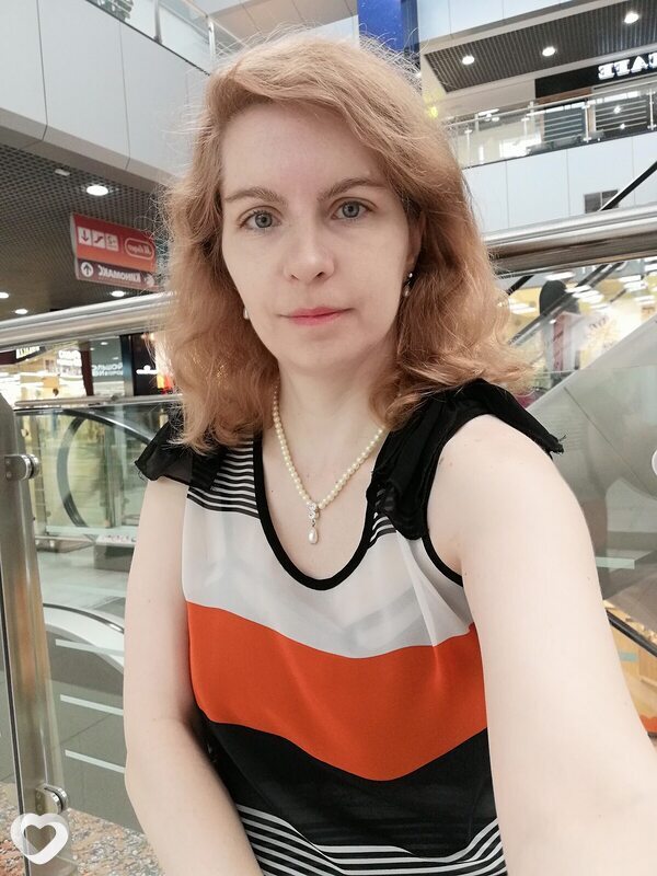 Мила