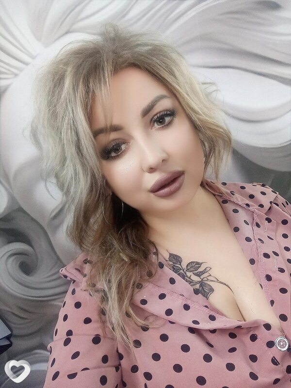 Мила