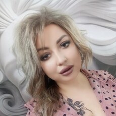 Мила