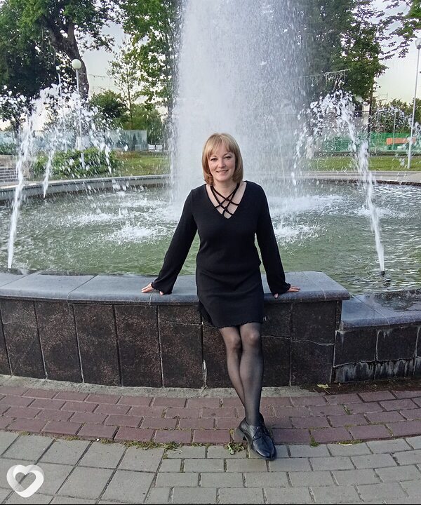Мила