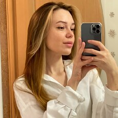 Мила