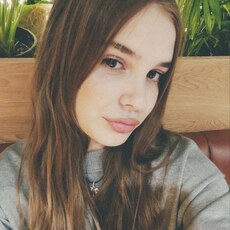 Оля