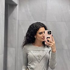 Мила