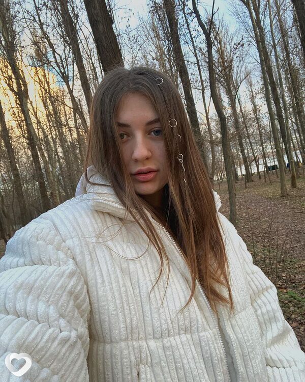 Мила