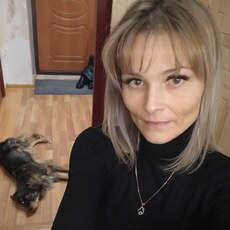 Мила