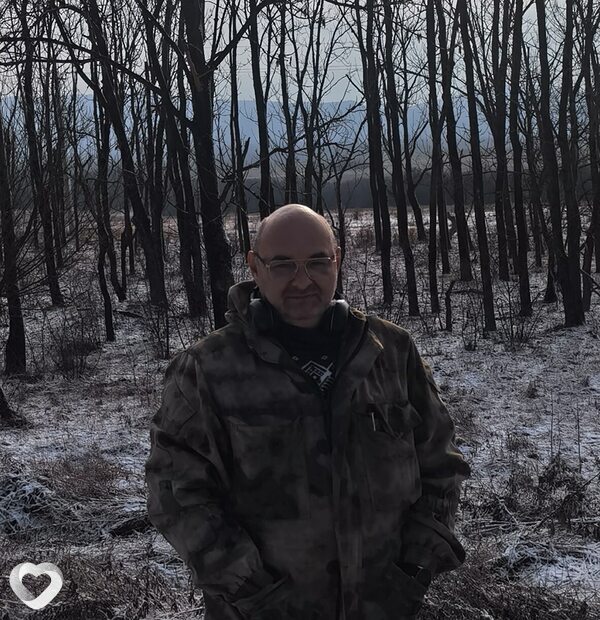 Николай