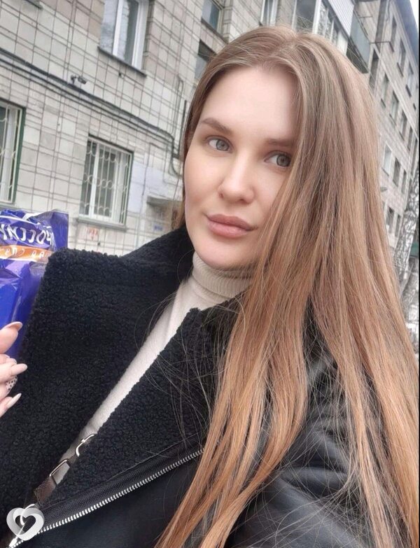 Мила