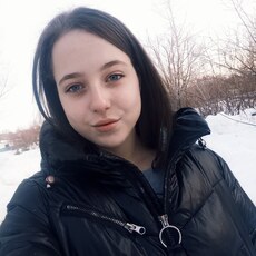 Оля